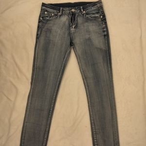 Destressed look skinny jeans. 30 waist.